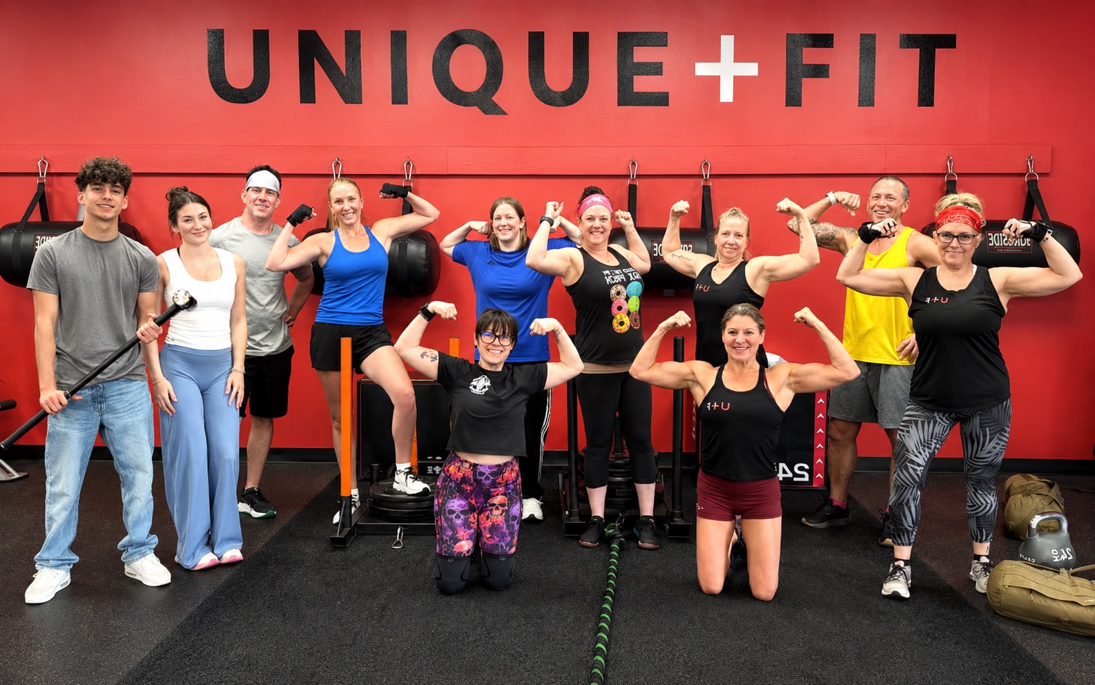 Members flexing after a Unique+Fit group class in the Sellersville studio